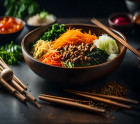 vecteezy_the-camera-is-getting-closer-to-bibimbap-a-popular-food_33323264.jpg